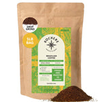 A 1-lb bag of Kochere Coffee Brazilian Santos Medium Roast by Kochere Coffee Company, with smooth, elegant cocoa notes, fresh and roasted to order, drip grind coffee grounds spilled in front.