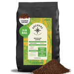 A 2-pound bag of Kochere Coffee Brazilian Santos Medium Roast by Kochere Coffee Company, with a pile of coarse ground coffee in front. The label highlights its freshness, single origin, smooth cocoa notes, and elegant flavor.