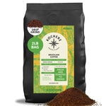 A 2-pound bag of Kochere Coffee Brazilian Santos Medium Roast from Kochere Coffee Company, featuring smooth, elegant cocoa notes and labeled as single-origin specialty coffee, with some ground coffee spilled in front.