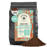 A 5lb bag of Kochere Coffee Horn of Africa Reserve Signature Espresso Blend by Kochere Coffee Company, a medium-dark roast, with coarse grounds spilled in front of the bag.