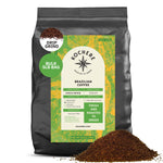 A 5-pound bag of Kochere Coffee Company’s Brazilian Santos Medium Roast—smooth, elegant, with cocoa notes—features fresh, roasted-to-order ground coffee and a pile of premium ground coffee in front.