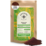 A 12oz bag of Kochere Coffee Brazilian Santos Medium Roast from Kochere Coffee Company, featuring a fine grind and green label with origin, roast level, and freshness details; ground coffee is displayed in front. Savor smooth cocoa notes every cup.