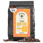 A 5 lb bag of Kochere Coffee Company’s Colombian Medellin Single Origin Medium Roast, featuring dried orange and berry notes. Whole beans are fresh, roasted-to-order, with some scattered in front.
