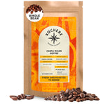 A 12oz (340g) bag of Kochere Coffee Company’s Costa Rican Alajuela Medium Light Roast, with an orange and yellow label and coffee beans in front; features sweet apple and raisin notes.