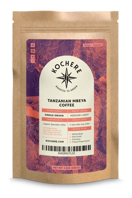 A bag of Tanzanian Mbeya Coffee - Simple Origin - Medium Light Roast by Kochere Coffee Company with a label on it.