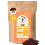 A 1-pound bag of Kochere Coffee Company Colombian Medellin Single Origin Medium Roast, with dried orange and berry notes, fine grind, is shown with ground coffee spilled beside the package. [1lb][fine grind]