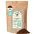 A 1lb resealable kraft bag of Kochere Coffee Company's Ethiopian Sidamo Natural Medium-Light Roast, featuring milk chocolate and fruity notes, sits upright with drip-grind coffee grounds spilled in front.