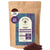 A 1lb bag of Kochere Coffee Company’s Honduran Marcala Organic Medium Roast (Caramel, Spice, Brown Sugar notes) in fine grind, with a purple and teal label and a small pile of ground coffee in front.