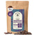 A 1 lb bag of Kochere Coffee Company’s Honduran Marcala Organic Medium Roast—featuring caramel, spice, and brown sugar notes—is surrounded by coffee beans, ideal for fair trade coffee lovers.
