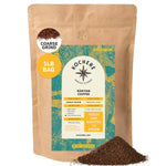 A 1lb bag of Kochere Coffee Kenyan Nyeri Embu AB, coarse grind, sits with coffee grounds beside it. The label highlights single origin, medium-light roast, fresh to order by Kochere Coffee Company with lemon and blackberry notes.