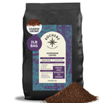 A 2lb bag of Kochere Coffee Company's Honduran Marcala Organic Medium Roast—caramel, spice, and brown sugar notes—with coarse ground coffee spilling out in front.[2LB][coarse grind]