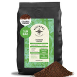 A 2lb bag of Kochere Coffee Company's Ugandan Sipi Falls Single Origin, Organic Medium Roast with raisin, fig, and brown sugar notes. Some ground coffee is spilled in front of the bag.[2lb][coarse grind]