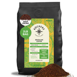 A 2-pound bag of Kochere Coffee Brazilian Santos Medium Roast from Kochere Coffee Company, featuring smooth, elegant cocoa notes and labeled as single-origin specialty coffee, with some ground coffee spilled in front.[2lb][drip grind]