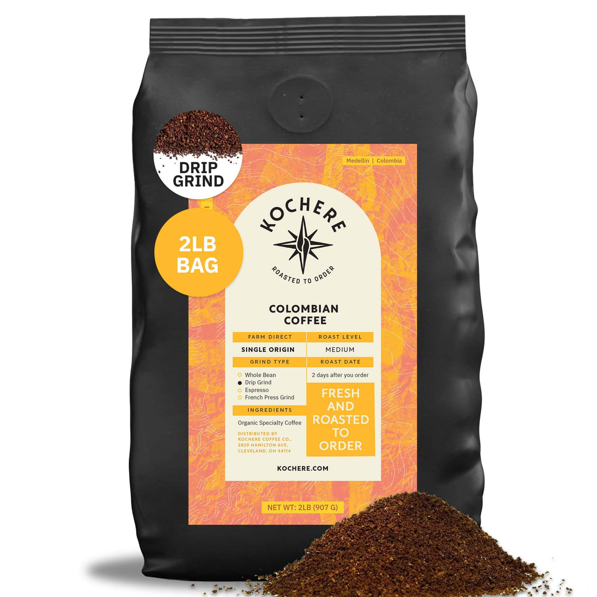 A 2lb bag of Kochere Coffee Company’s Colombian Medellin Single Origin Medium Roast, drip grind, with dried orange and berry notes, is shown with coffee grounds spilled in front.[2lb][drip grind]