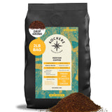 A 2lb bag of Kochere Coffee Company’s Kenyan Nyeri Embu AB Medium-Light Roast sits with a pile of ground coffee, featuring a fruity, balanced, bright cup and drip grind, single origin from Nyeri Embu.