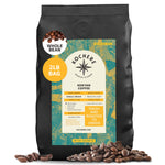 A 2lb bag of Kochere Coffee Kenyan Nyeri Embu AB Medium-Light Roast by Kochere Coffee Company features lemon and blackberry notes, with whole beans and a front label showing origin, roast level, and freshness for quality assurance.
