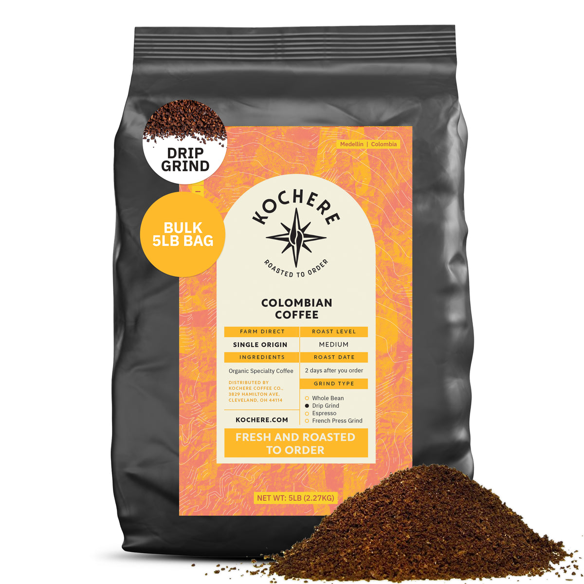 A 5lb bag of Kochere Coffee Colombian Medellin Single Origin Medium Roast, drip grind, with dried orange and berry notes; Fairtrade certified by Kochere Coffee Company. Ground coffee is piled in front. [5lb][drip grind]