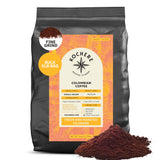 A 5lb bag of Kochere Coffee Colombian Medellin Single Origin Medium Roast by Kochere Coffee Company, featuring dried orange and berry notes. Packaging displays Fairtrade and fresh-to-order roasting, with ground coffee shown in front. [5lb][fine grind]
