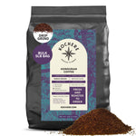 A 5-pound bag of Kochere Coffee Company's Honduran Marcala Organic Medium Roast, featuring caramel, spice, and brown sugar notes. The label highlights fresh roasting, single origin, rich flavor, and fair trade qualities. Ground coffee shown in front.[5LB][drip grind]