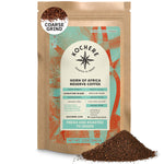 A 12 oz bag of Kochere Coffee Company’s Horn of Africa Reserve Signature Espresso Blend, medium-dark roast, with coarse grounds beside it. The label showcases its specialty origin, roast level, and outstanding freshness. [12 oz][coarse grind]
