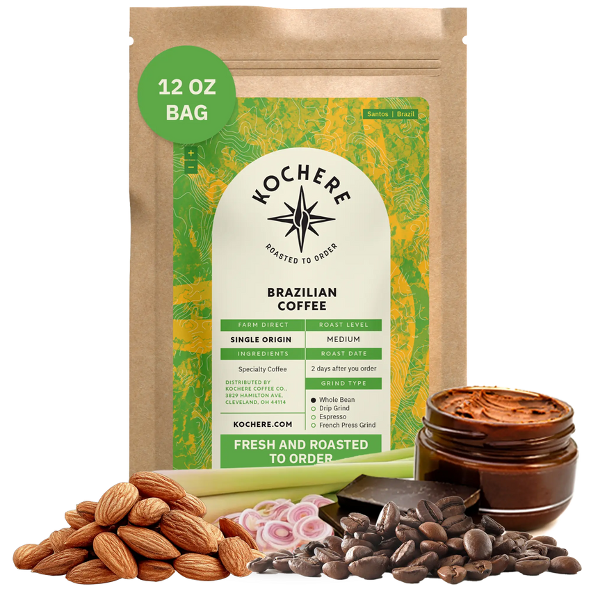Bag of Kochere Single Origin Brazilian medium roast coffee, displayed with raw almonds, fresh lemongrass, and dark chocolate to represent its balanced, aromatic flavor profile. [12 oz][Whole Bean]