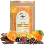 Bag of Kochere Single Origin Colombian medium roast coffee, displayed with rich chocolate, fresh oranges, and sweet mixed berries to represent its vibrant flavor profile. [12 oz][Whole Bean]