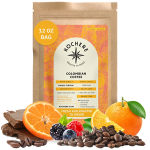 Bag of Kochere Single Origin Colombian medium roast coffee, displayed with rich chocolate, fresh oranges, and sweet mixed berries to represent its vibrant flavor profile. [12 oz][Whole Bean]