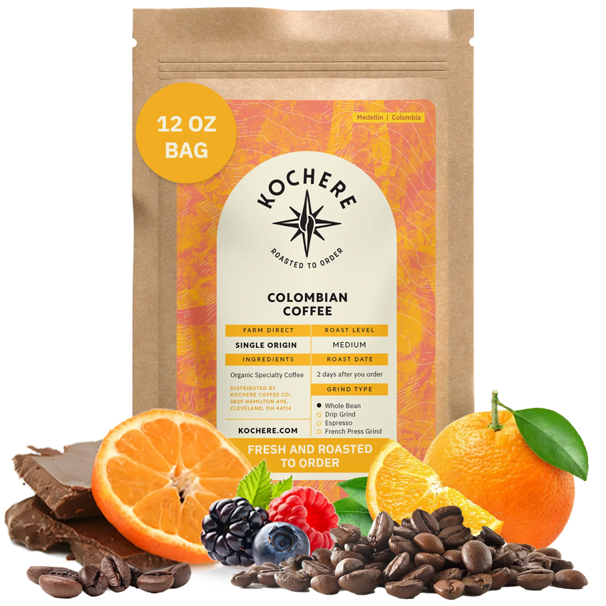 Bag of Kochere Single Origin Colombian medium roast coffee, displayed with rich chocolate, fresh oranges, and sweet mixed berries to represent its vibrant flavor profile. [12 oz][Whole Bean]