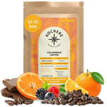 Bag of Kochere Single Origin Colombian medium roast coffee, displayed with rich chocolate, fresh oranges, and sweet mixed berries to represent its vibrant flavor profile. [12 oz][Whole Bean]