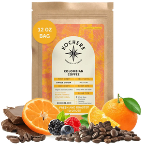 Bag of Kochere Single Origin Colombian medium roast coffee, displayed with rich chocolate, fresh oranges, and sweet mixed berries to represent its vibrant flavor profile. [12 oz][Whole Bean]