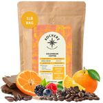 Bag of Kochere Single Origin Colombian medium roast coffee, displayed with rich chocolate, fresh oranges, and sweet mixed berries to represent its vibrant flavor profile. [1LB][Whole Bean]
