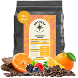 Bag of Kochere Single Origin Colombian medium roast coffee, displayed with rich chocolate, fresh oranges, and sweet mixed berries to represent its vibrant flavor profile. [5LB][Whole Bean]