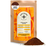 A 12-ounce bag of Kochere Coffee Costa Rican Alajuela Medium Roast from Kochere Coffee Company, featuring sweet apple and raisin notes, with ground coffee artfully spilled in front of the package.[12 oz][drip grind]