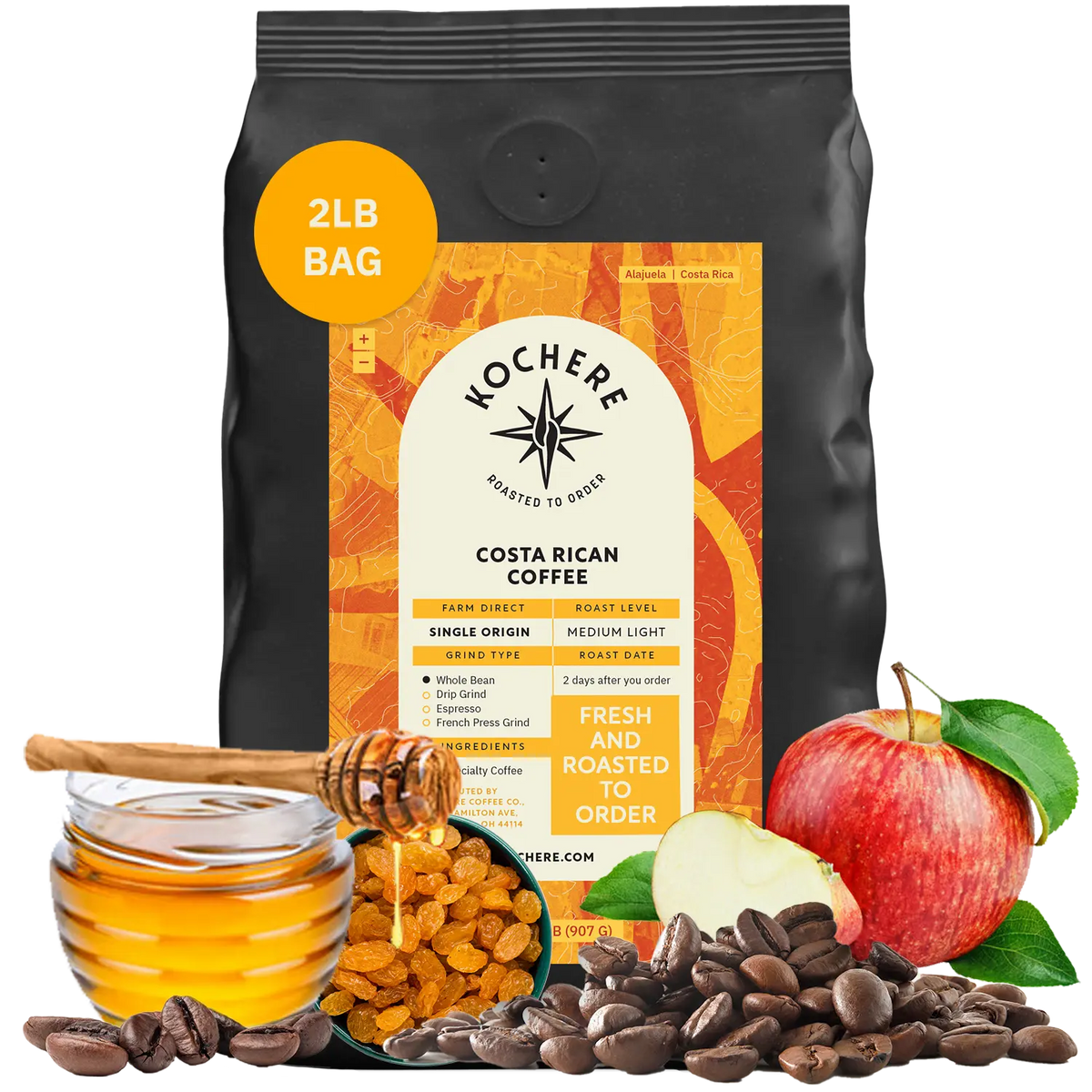 A 2lb bag of Kochere Coffee Company’s Costa Rican Alajuela Medium Roast—featuring sweet apple and raisin notes—is displayed with honey, raisins, coffee beans, and an apple artistically arranged in front of the package.[2LB][Whole Bean]
