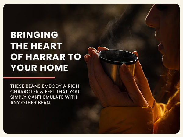 Person in yellow jacket holding a steaming metal cup near their face, with text promoting medium roasted coffee for balanced flavor.