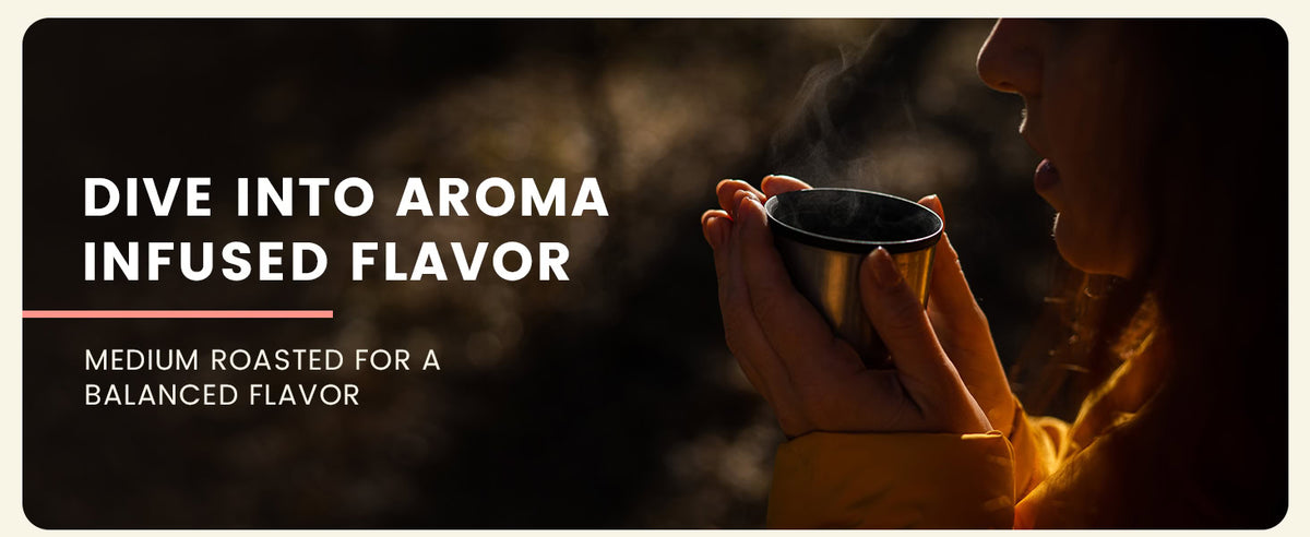 Person in yellow jacket holding a steaming metal cup near their face, with text promoting medium roasted coffee for balanced flavor.
