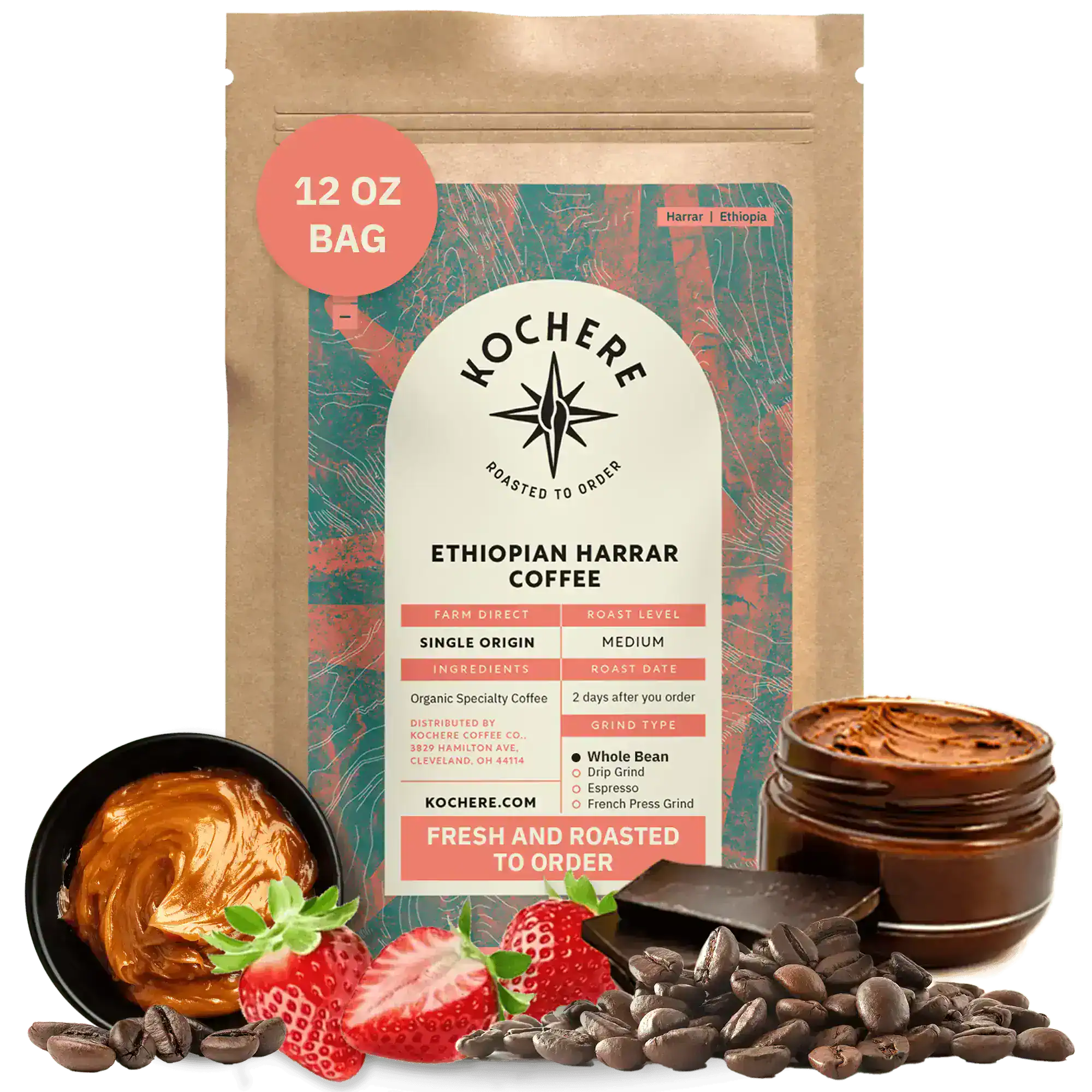 A 12 oz bag of Kochere Coffee Ethiopian Harrar Natural Medium Roast by Kochere Coffee Company stands upright, surrounded by coffee beans, strawberries, chocolate pieces, and a jar of chocolate spread.[12 oz][Whole Bean]