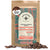 A 12oz bag of Kochere Coffee Ethiopian Harrar Natural Medium Roast by Kochere Coffee Company, with a colorful label, surrounded by scattered organic coffee beans. Features fruity blueberry and dark chocolate notes.