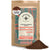 A brown bag labeled "Kochere Coffee Ethiopian Harrar Natural Medium Roast" with coffee grounds spilled beside it, showcasing single origin coffee from Kochere Coffee Company with fruity, blueberry, and dark chocolate notes.