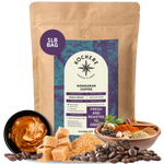 Bag of Kochere Single Origin Honduran medium-dark roast coffee, displayed with sweet caramel, brown sugar, and rustic spices to represent its rich and comforting flavor profile. [1LB][Whole Bean]