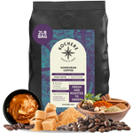Bag of Kochere Single Origin Honduran medium-dark roast coffee, displayed with sweet caramel, brown sugar, and rustic spices to represent its rich and comforting flavor profile. [2LB][Whole Bean]