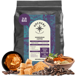 Bag of Kochere Single Origin Honduran medium-dark roast coffee, displayed with sweet caramel, brown sugar, and rustic spices to represent its rich and comforting flavor profile. [5LB][Whole Bean]