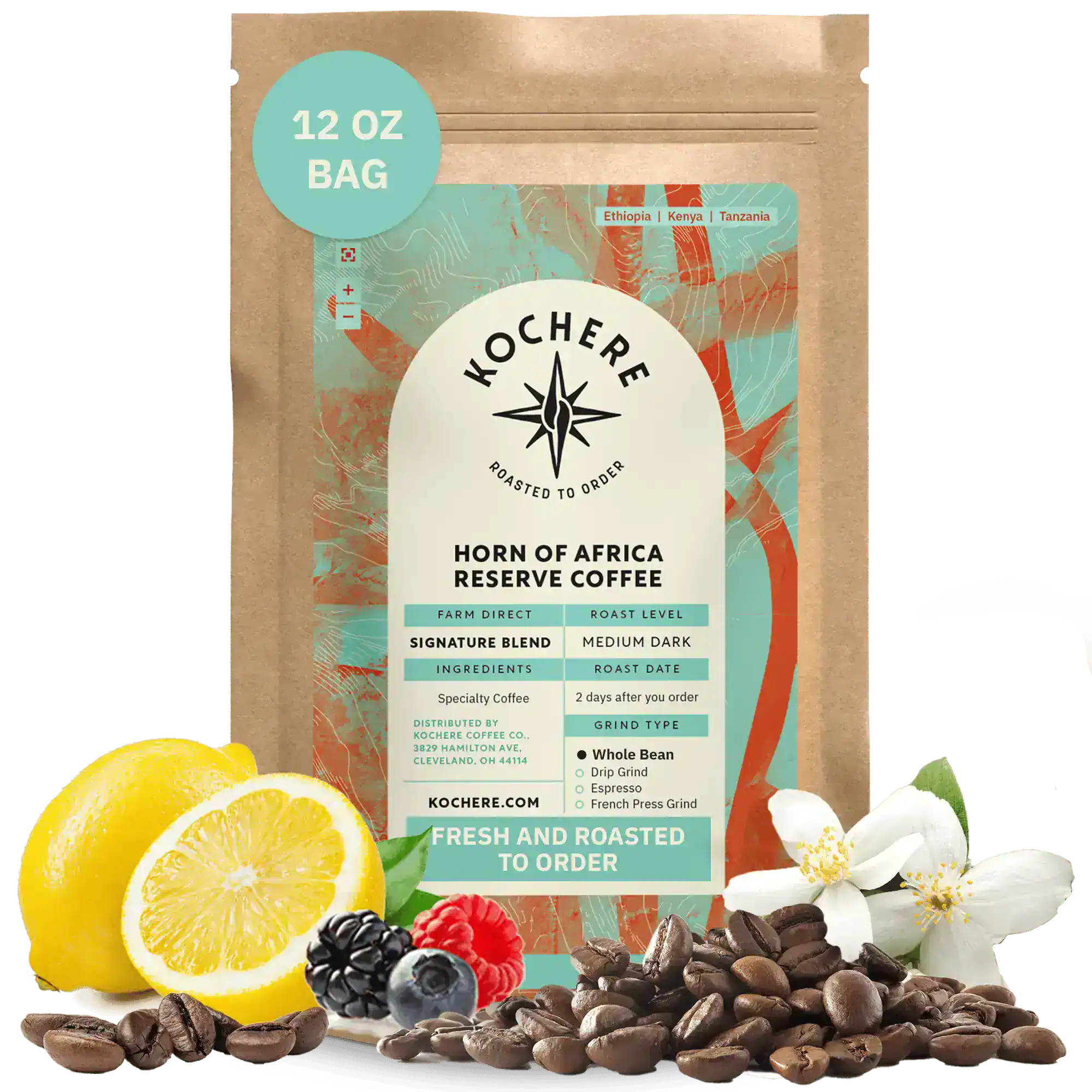 Kochere Horn of Africa Reserve medium-dark roast coffee, displayed with fresh lemons, berries, and white blossoms to represent its flavor profile. [12 oz][whole bean]