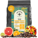 A 5-pound bag of Kochere Coffee Company’s Kenyan Nyeri Embu AB Medium-Light Roast, surrounded by coffee beans and assorted fruit, highlights its fruity, balanced flavor with bright citrus notes.[5LB][Whole Bean]