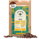 A 12oz bag of Kochere Coffee Kenyan Nyeri Embu AB Medium-Light Roast by Kochere Coffee Company, featuring lemon and blackberry notes, whole beans, and a teal and yellow label with coffee beans scattered nearby.