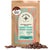 A 12oz bag of Kochere Coffee Ethiopian Sidamo Natural Medium-Light Roast by Kochere Coffee Company stands upright with scattered beans, featuring a green and orange design and noting its milk chocolate and fruity profile.