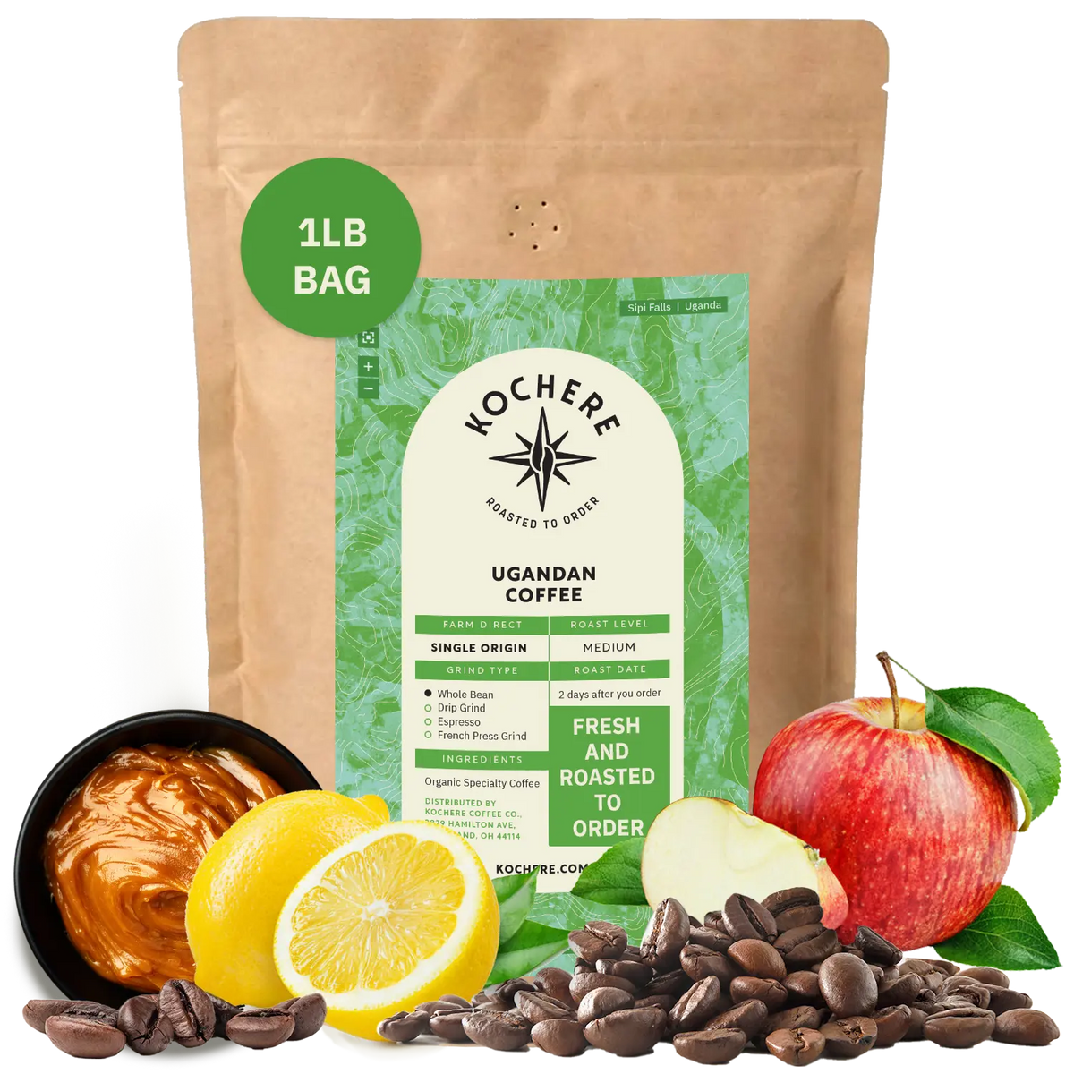 Bag of Kochere Single Origin Ugandan medium roast coffee, displayed with rich caramel, fresh lemons, and crisp red apples to represent its sweet and vibrant flavor profile. [1LB][Whole Bean]