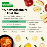 Advertisement for Ugandan coffee with fruit and a bowl of food on a white background. [all]